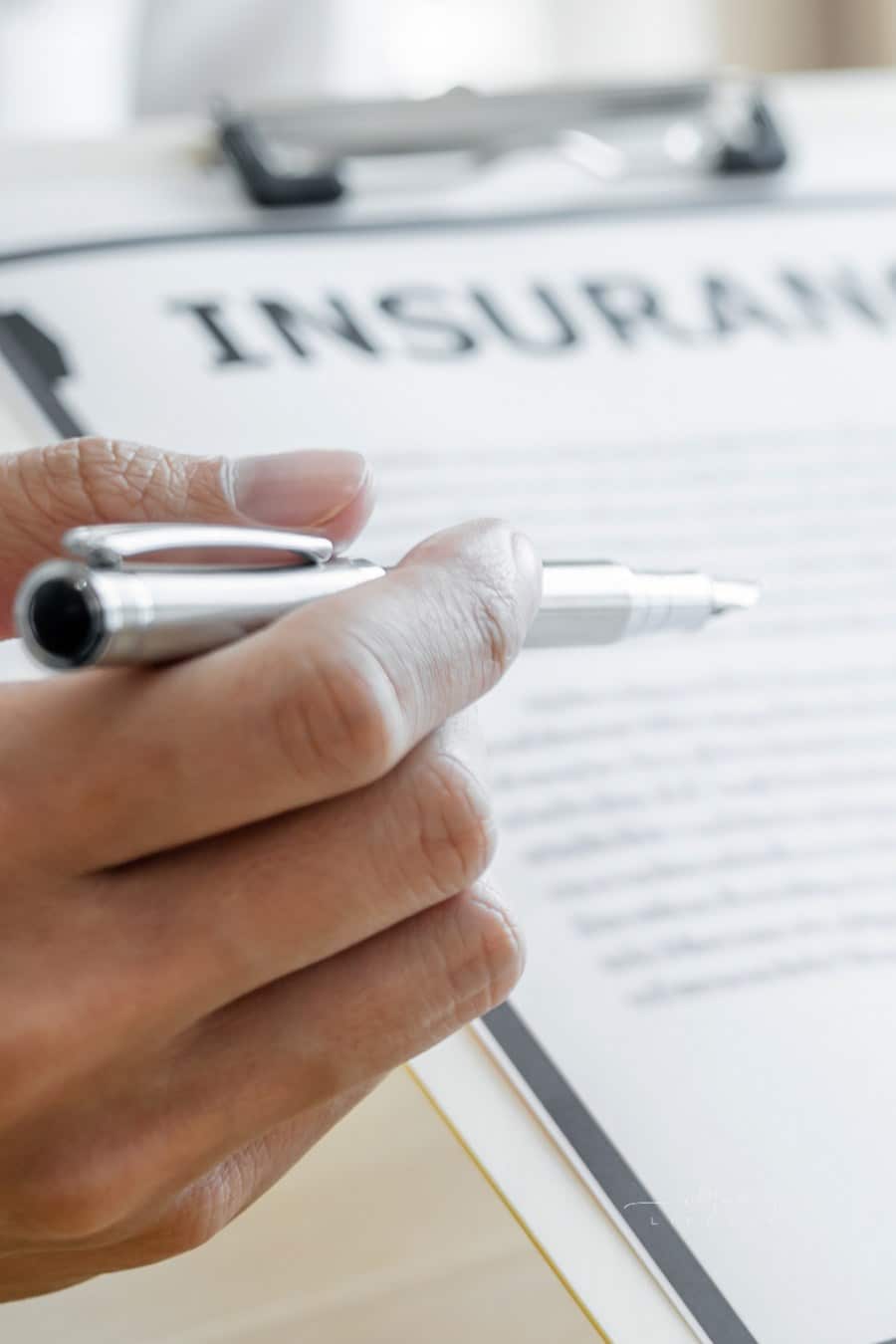 insurance agent meeting customer with insurance policy