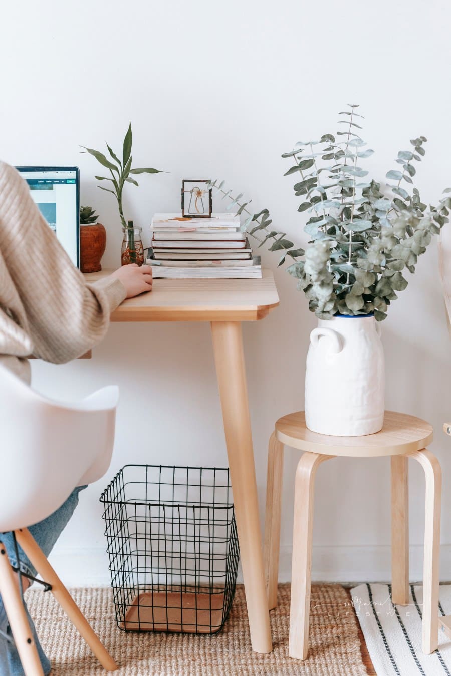 woman working on laptop in room