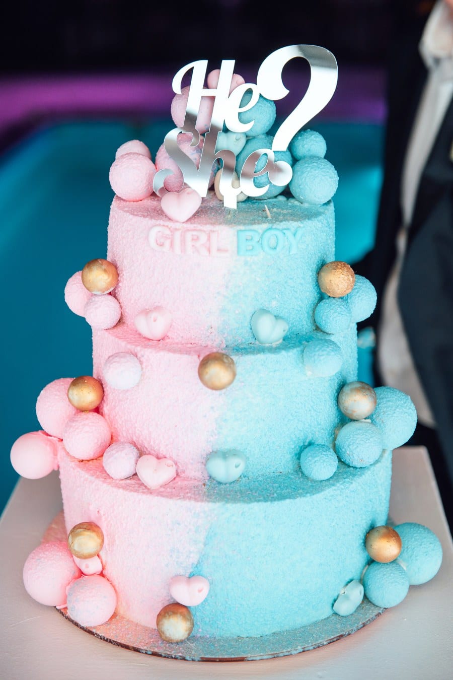 Big and delicious pink and blue baby gender reveal party cake