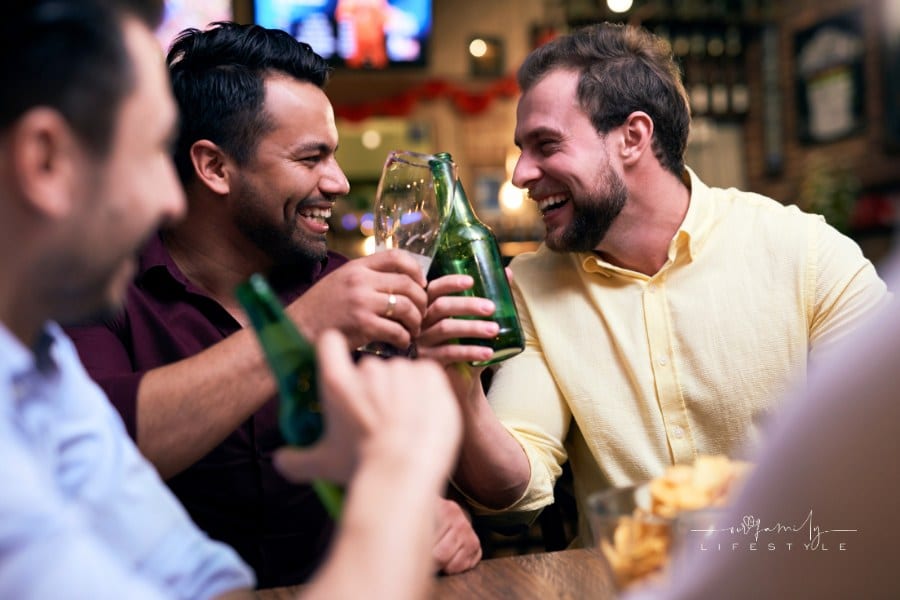 men celebrating a bachelor party at a bar