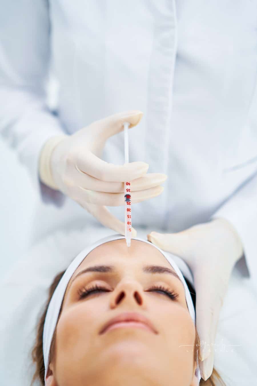 woman getting botox in forehead