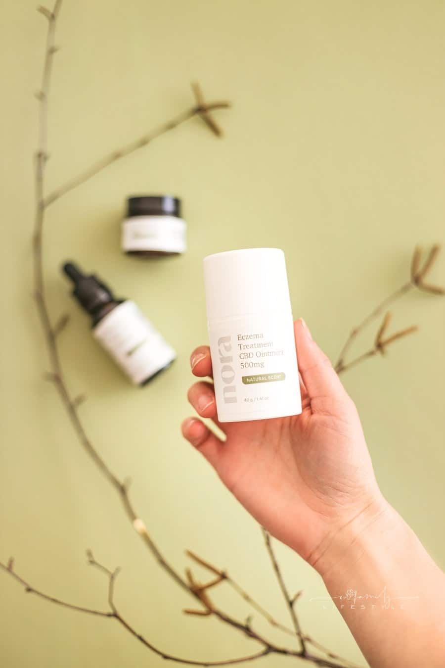 Close-up of Woman Holding a Natural Beauty Product