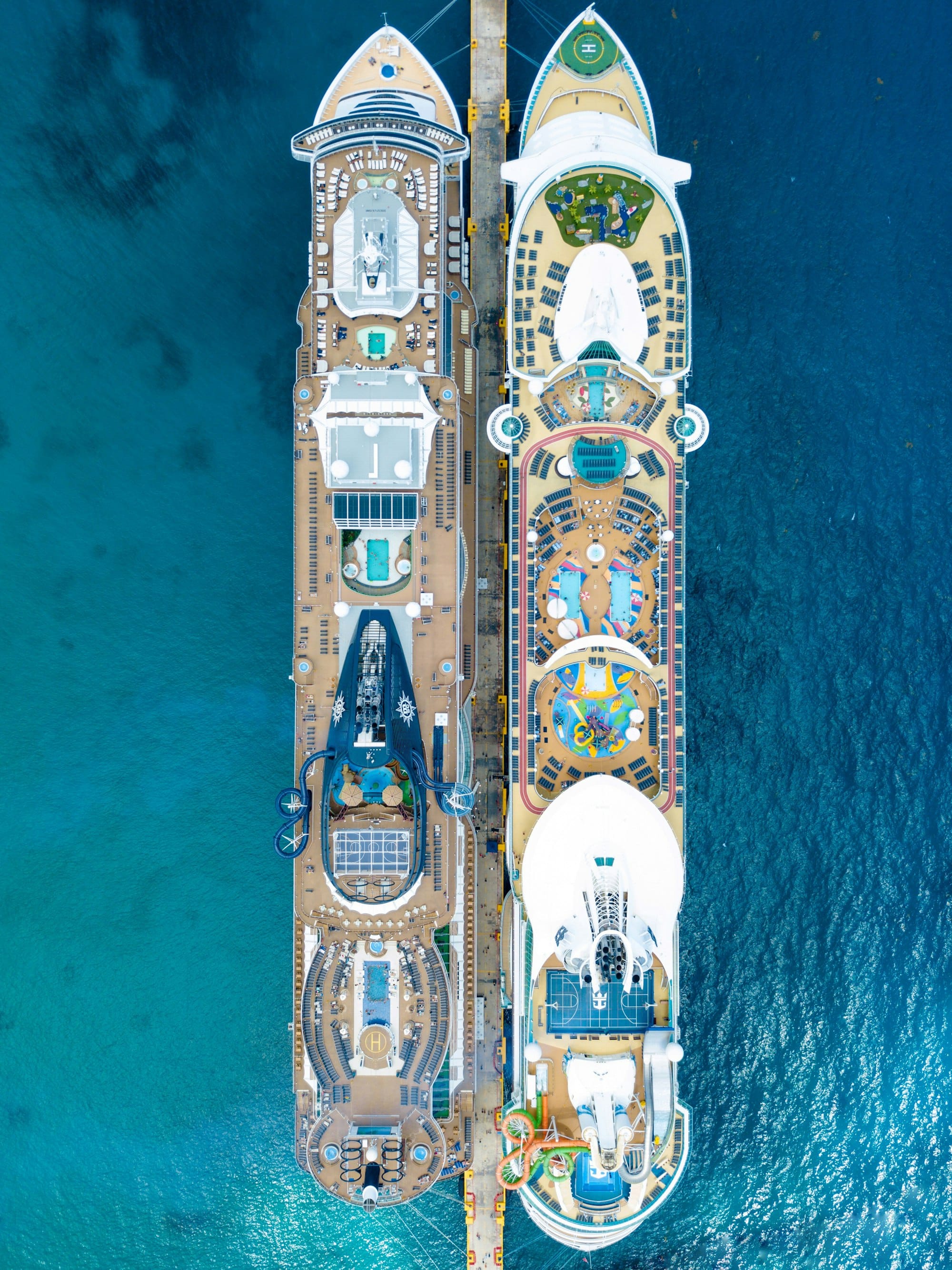 top view of two cruise ships side-by-side