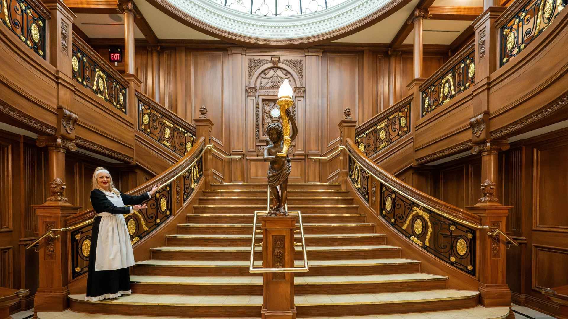 Ascend the Grand Staircase! Our welcoming crew invites you to experience this iconic recreation.