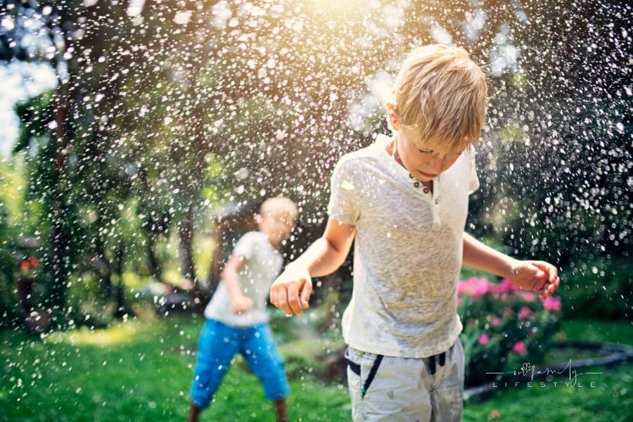 boys having a water ballon fight