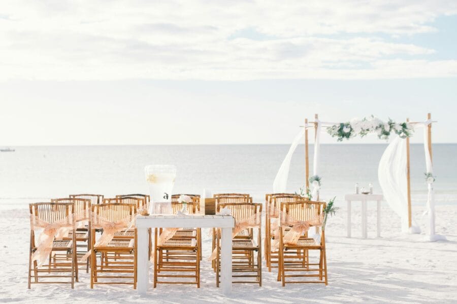 Beautiful wedding setup with chairs and arch on St. Pete Beach, Florida.