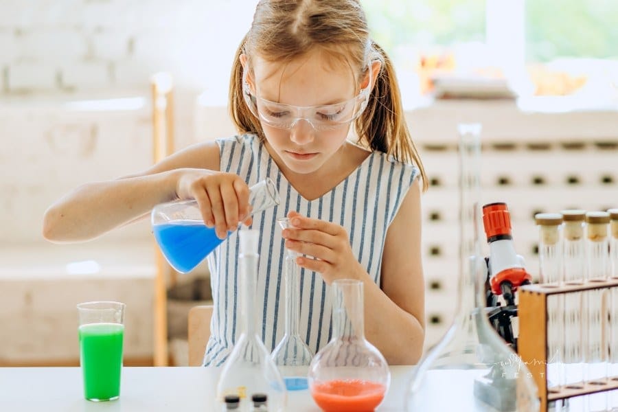 A Girl Doing a Science Experiment