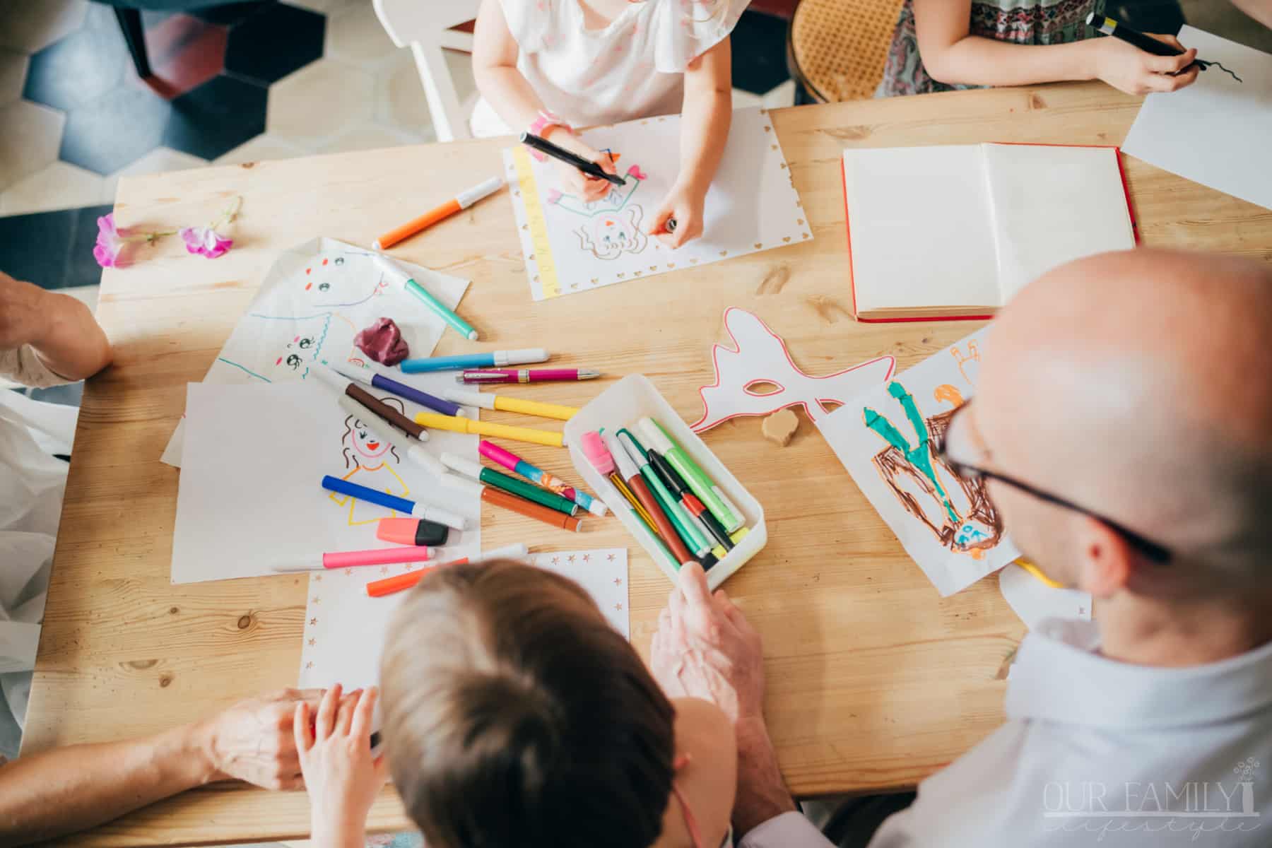 family drawing with colored pencils