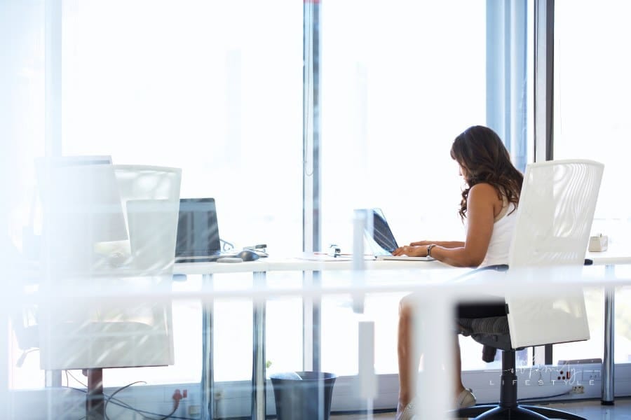 Woman Working Alone in an Office