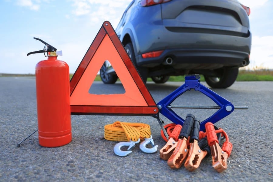 Emergency Warning Triangle and Car Safety Equipment Outdoors