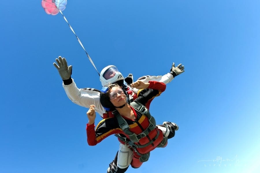 woman tandem skydive jump