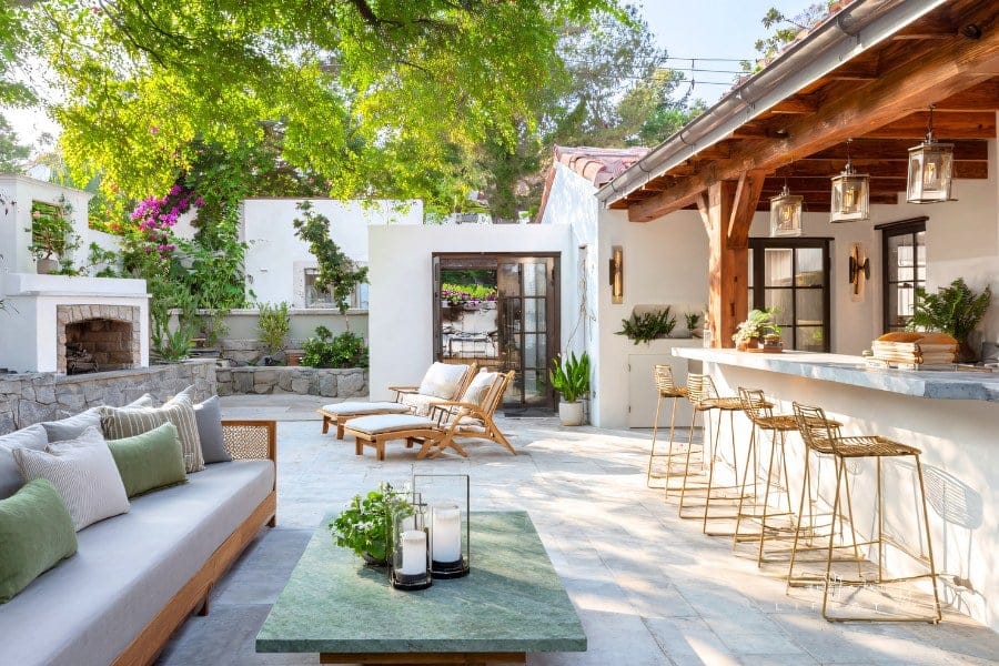 Sun-Drenched Mediterranean-Style Patio with Outdoor Kitchen
