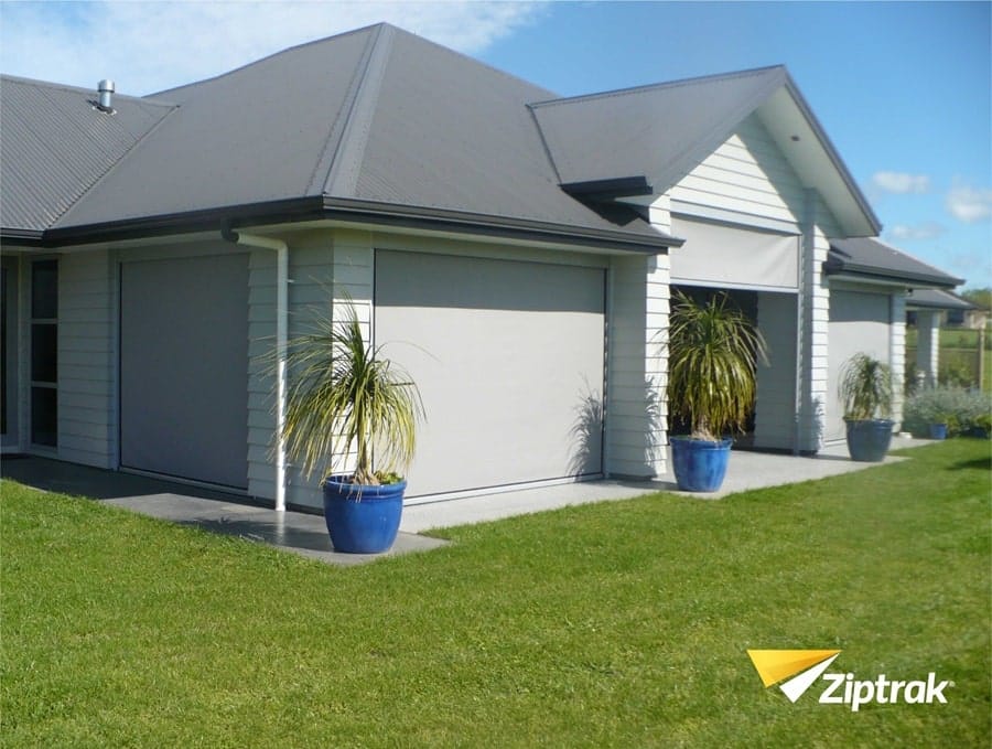 exterior roller blinds on house window