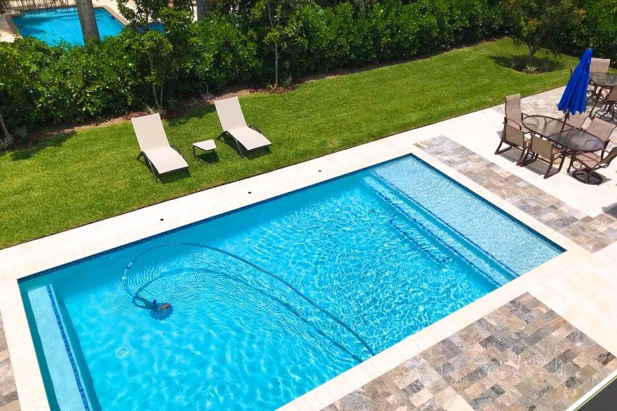 Swimming pool in the backyard of house