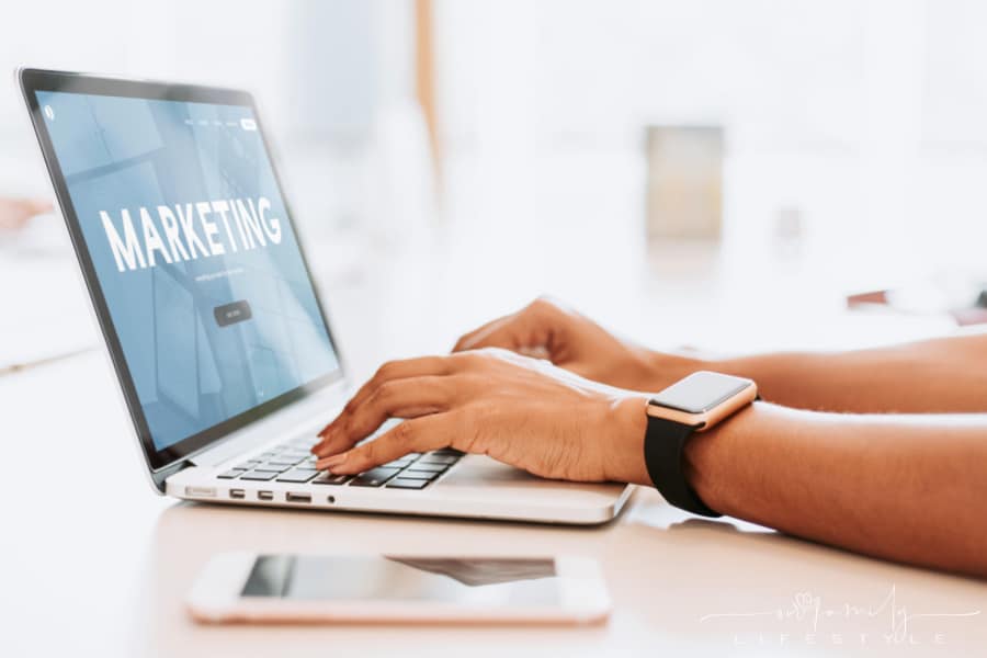 woman working on marketing strategy on laptop